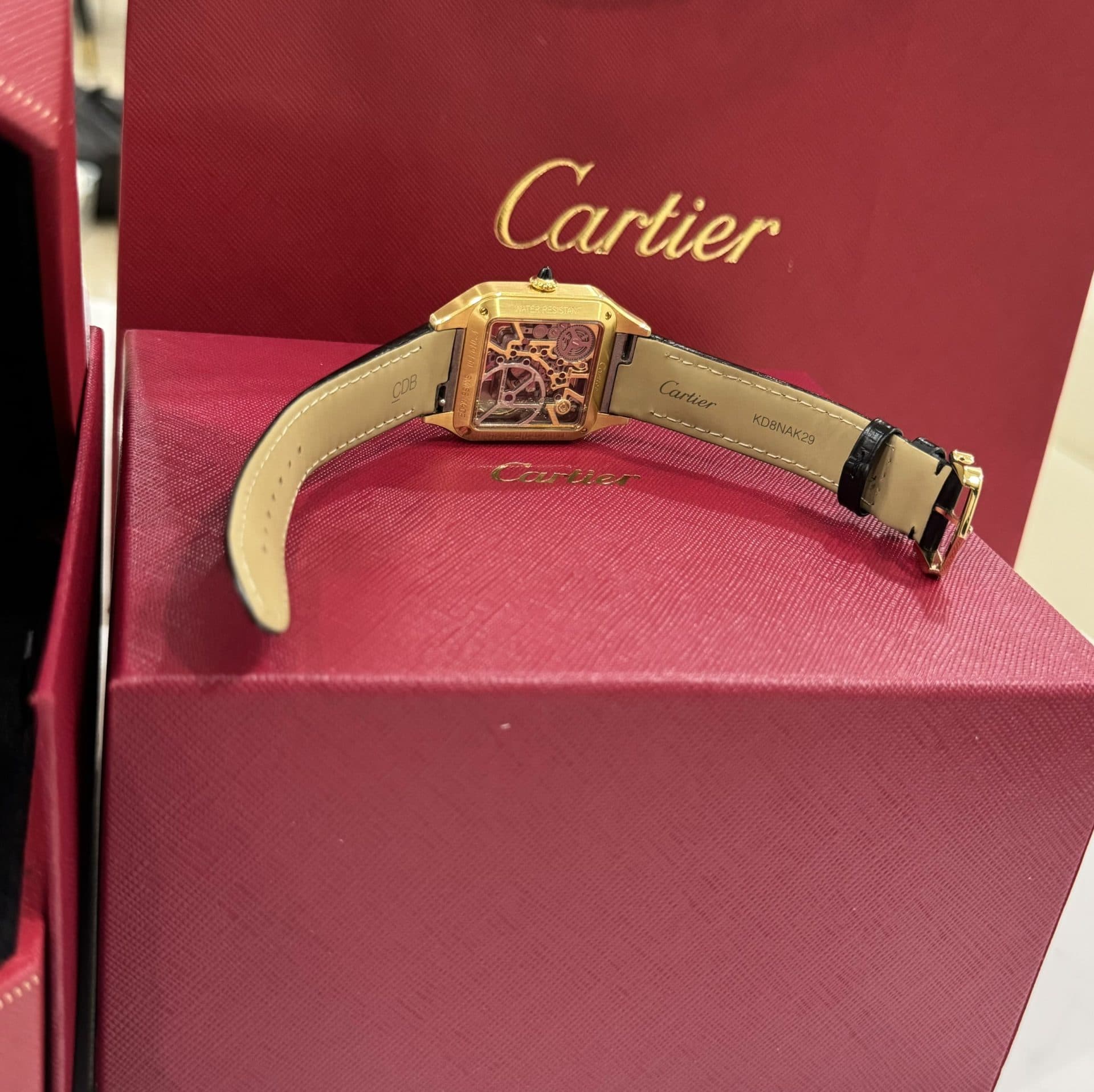 Dong-Ho-Cartier-Nam-Replica-11-Santos-WHSA0031-May-Pin-Thuy-Sy-31x43mm-7-1